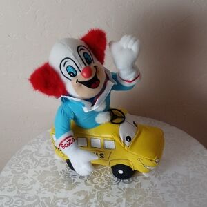 Vintage Bozo The Clown Plush Toy on Yellow Bus